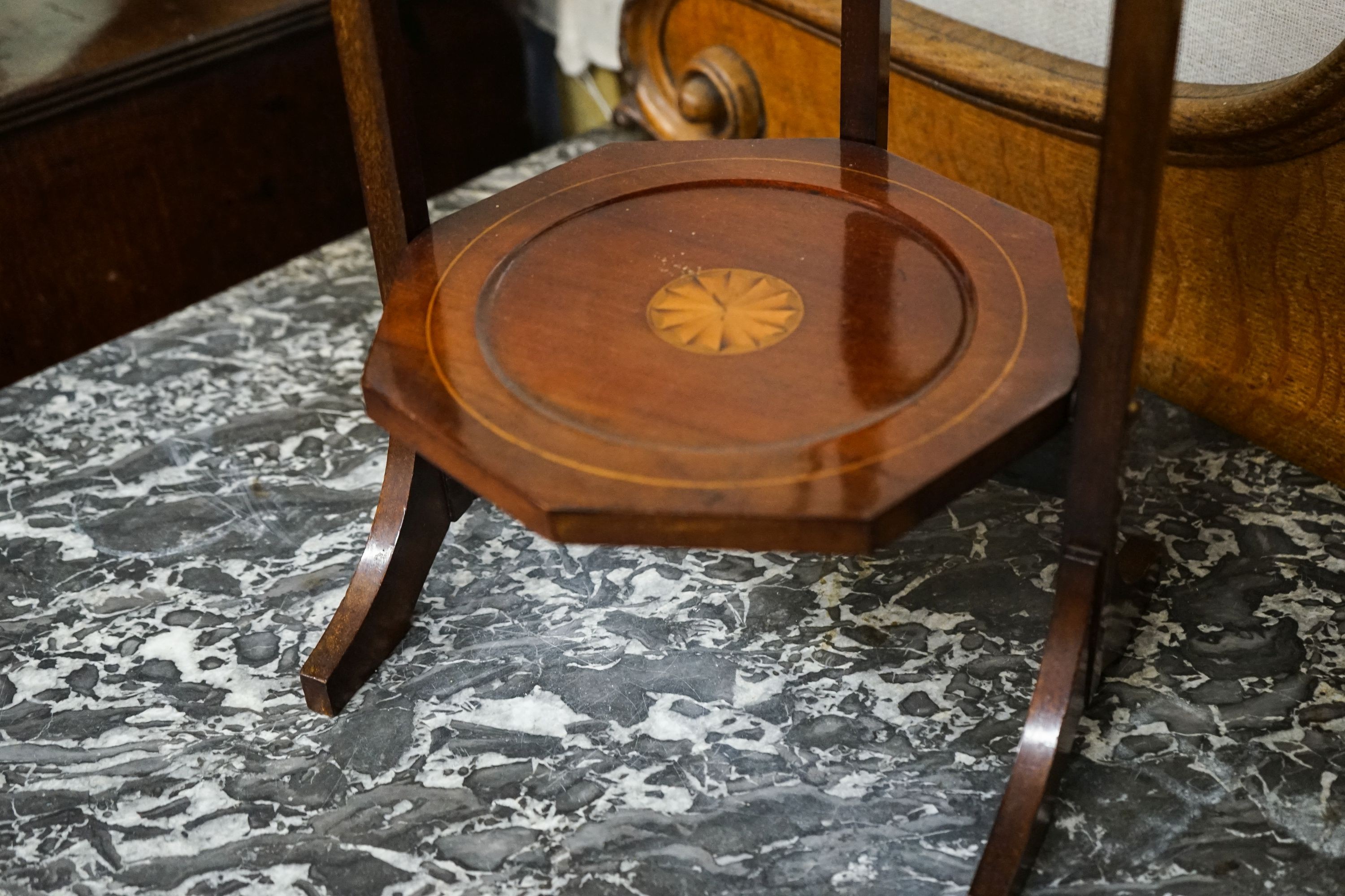 An Edwardian cake stand together with a skeleton framed toilet mirror